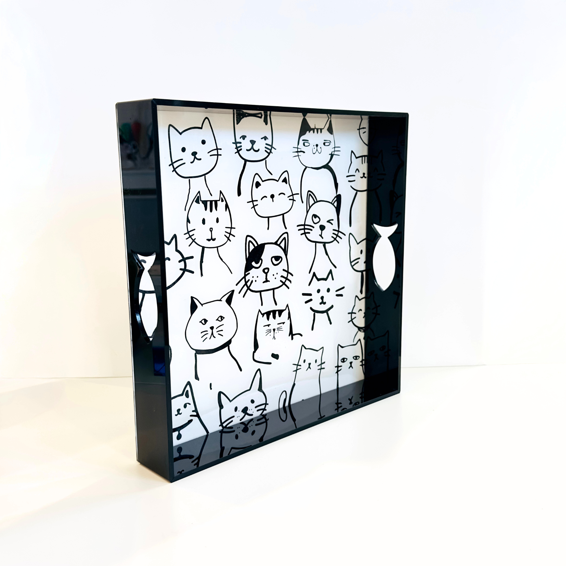 Maybee - Square Serving Tray - britt elizabeth black square tray on a white background with cat faces 