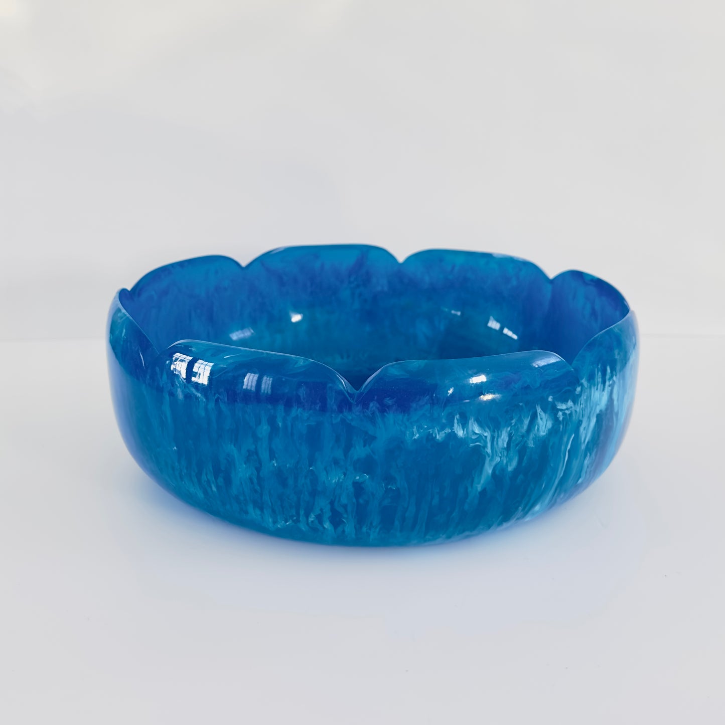 Blue textured bowl on a light gray background